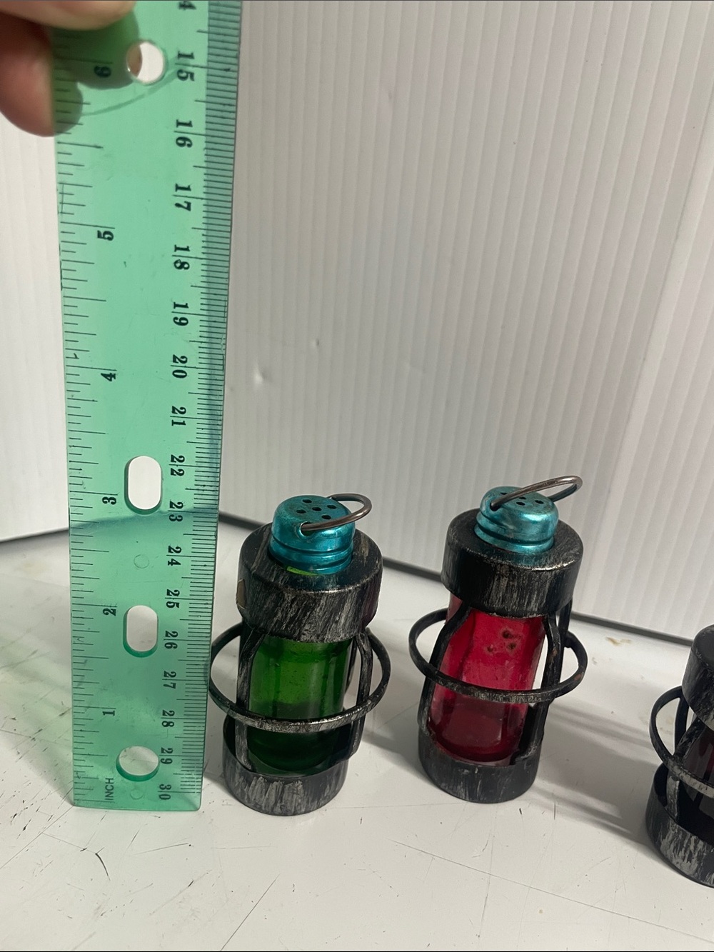 2 sets of salt and pepper shakers look like lanterns